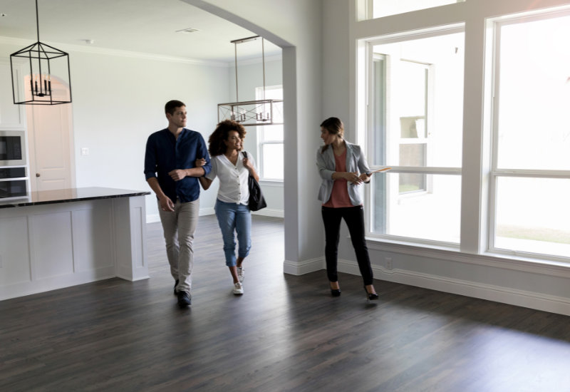 Real estate agent showing off a home