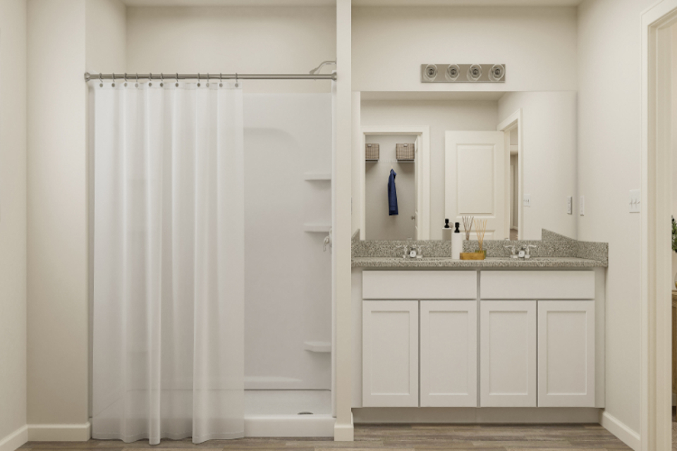 A bathroom with a shower curtain.