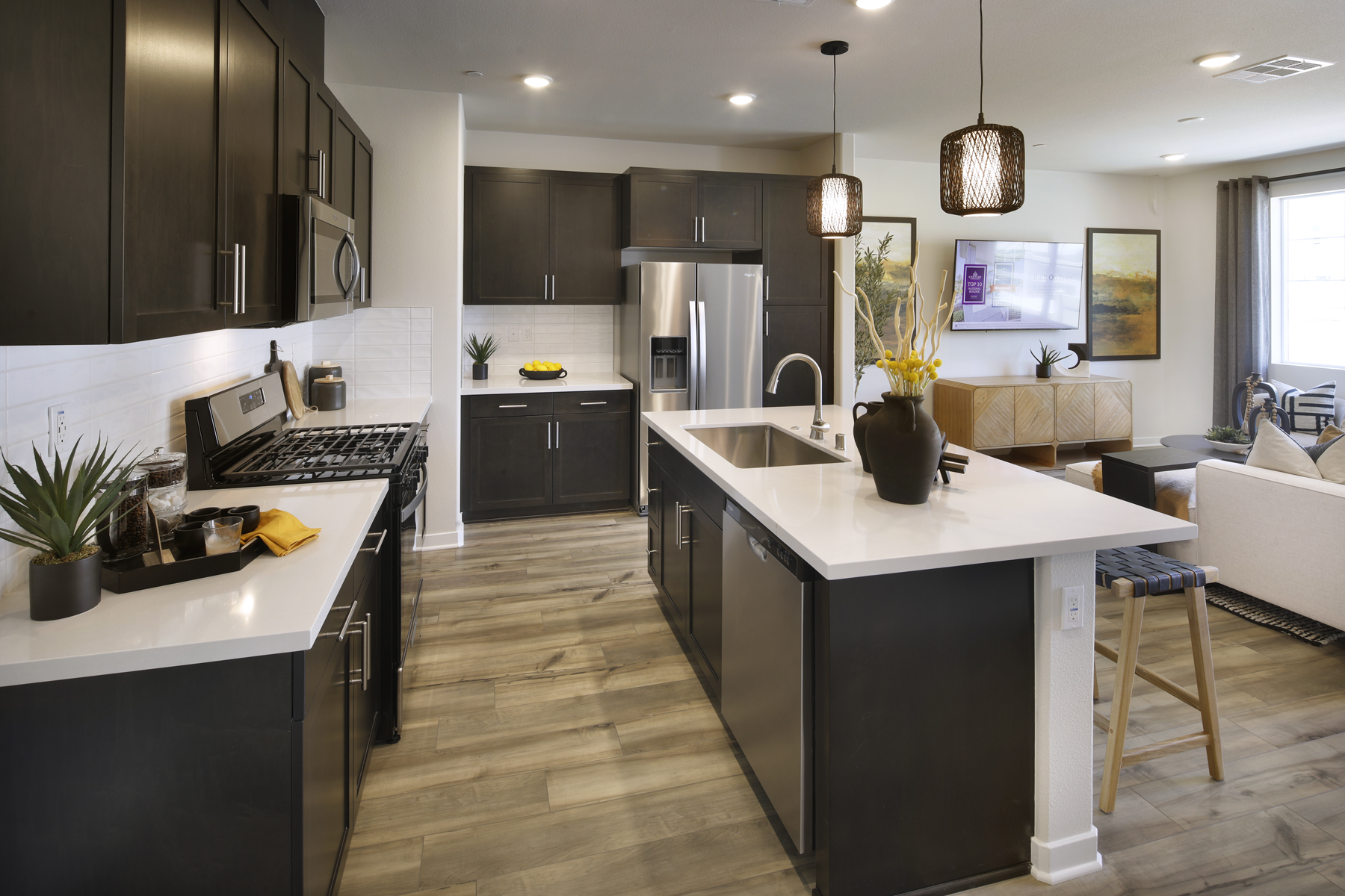 A kitchen with black appliances.