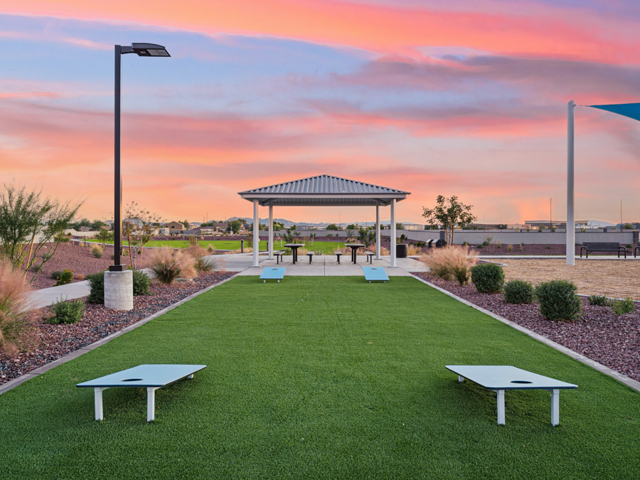A park with benches and a gazebo.