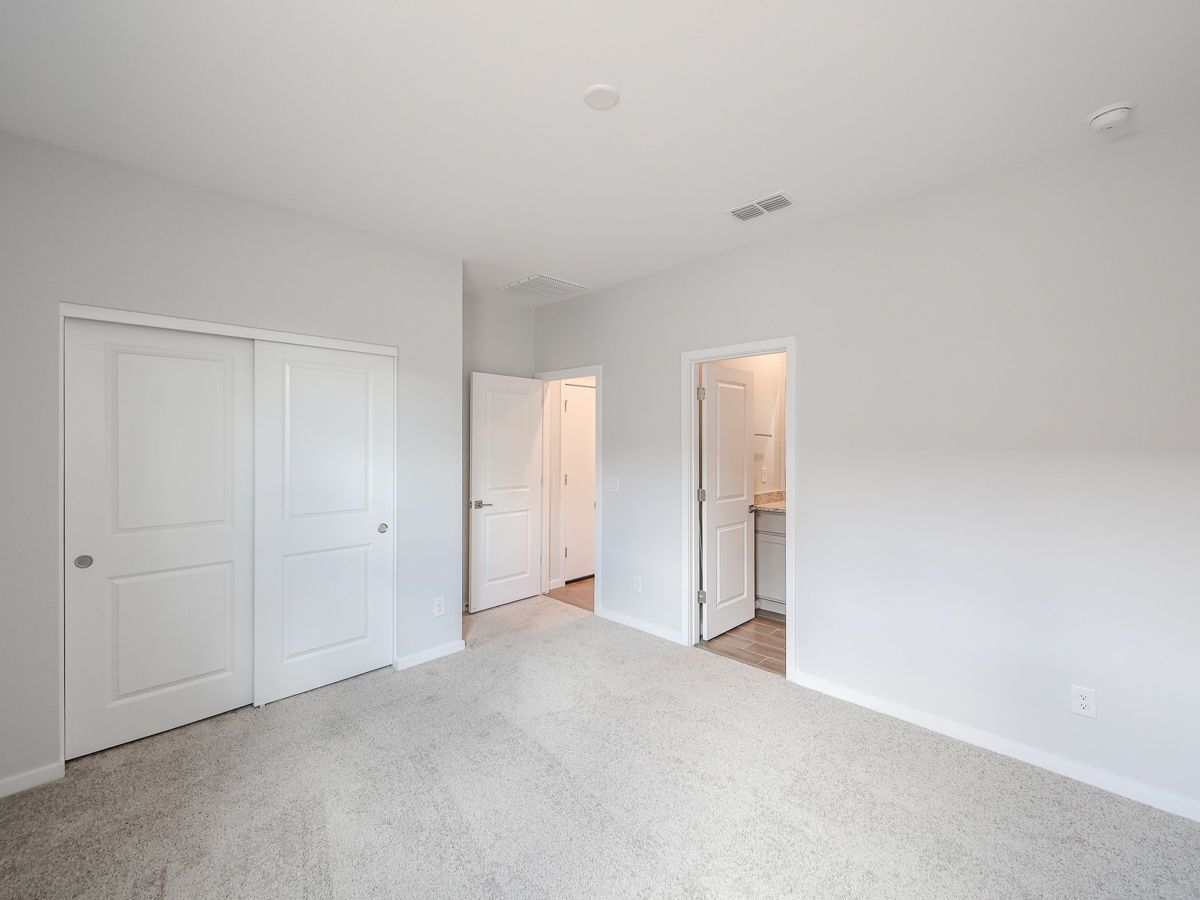 A room with white doors.