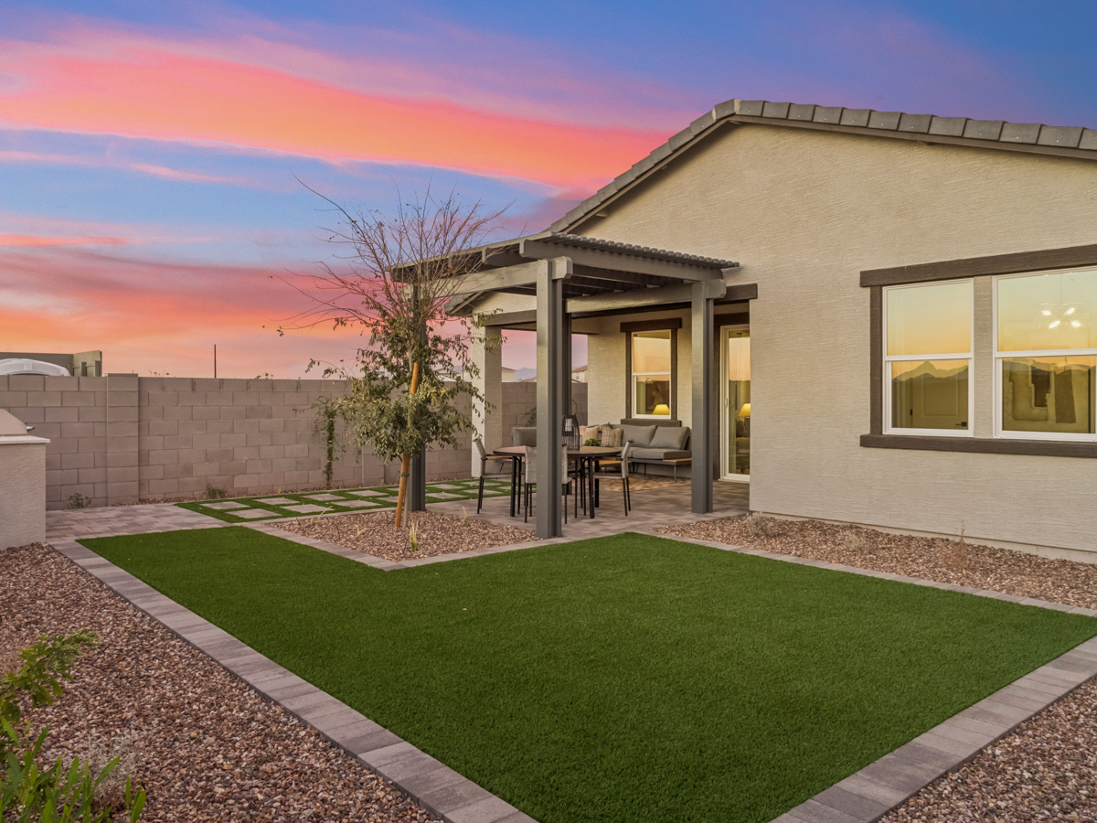 A house with a large front yard.