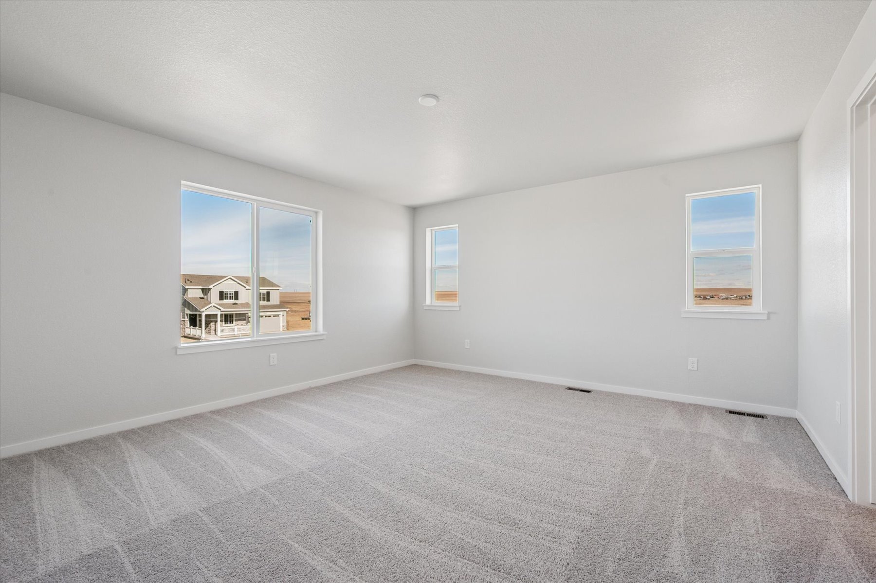 A room with a few windows.