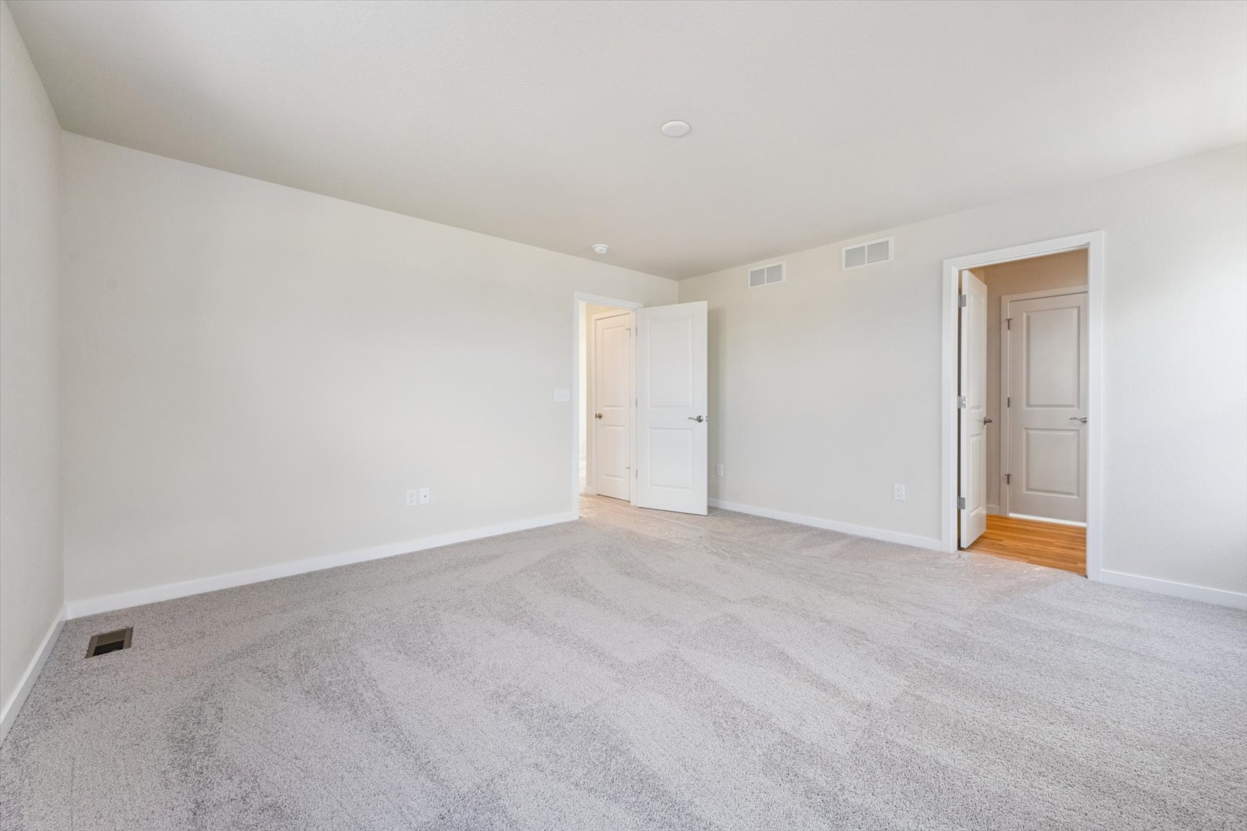 A room with white doors.