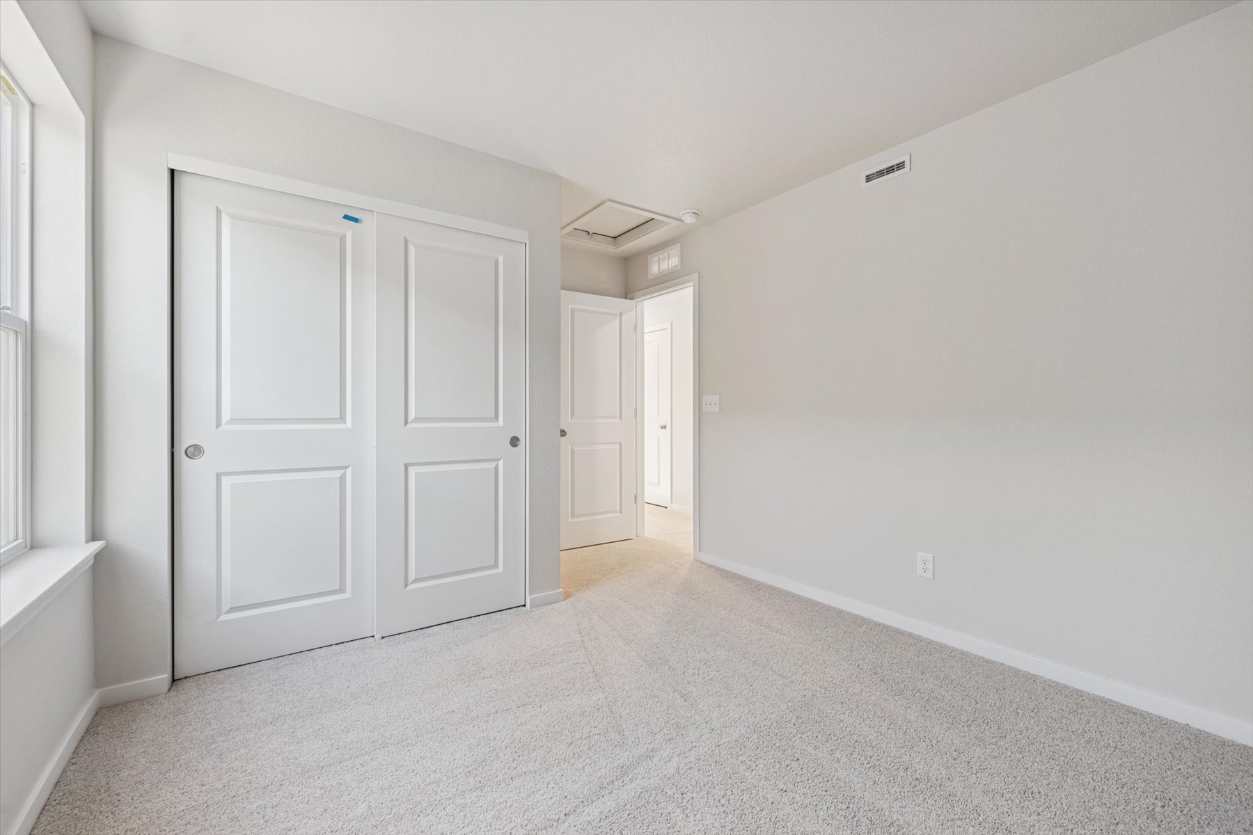 A room with white doors.