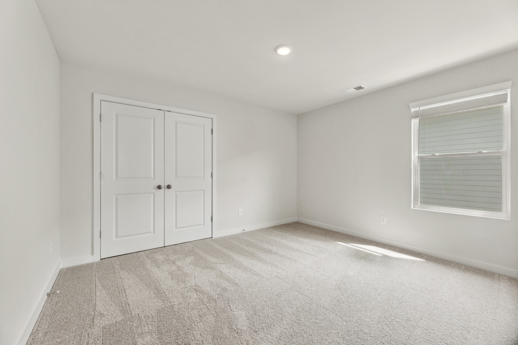 A room with white doors.
