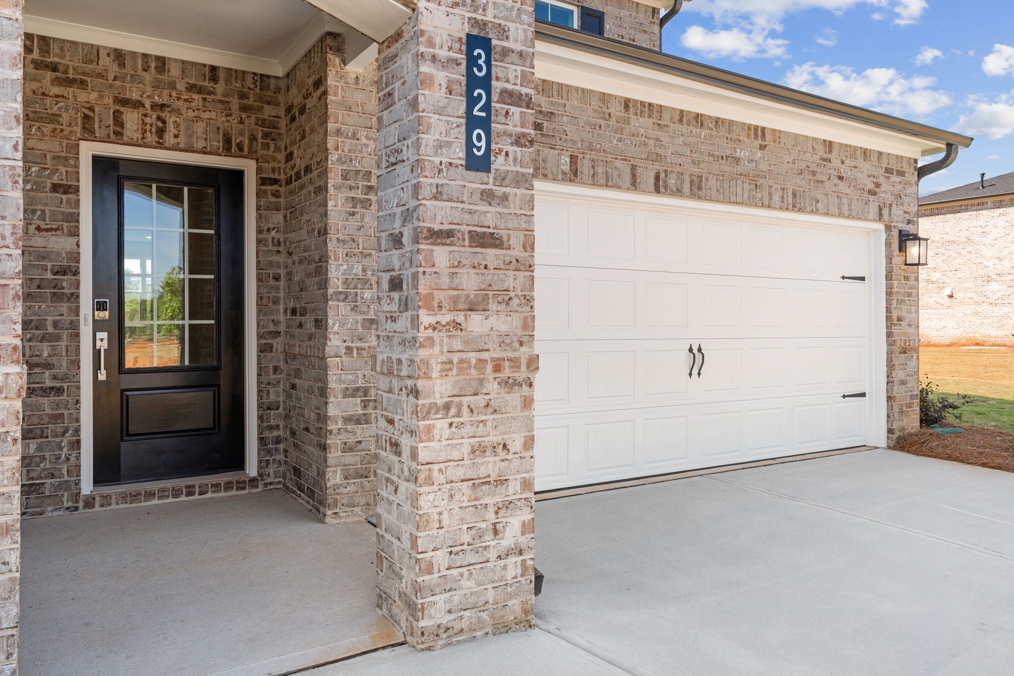 A garage door and a garage.