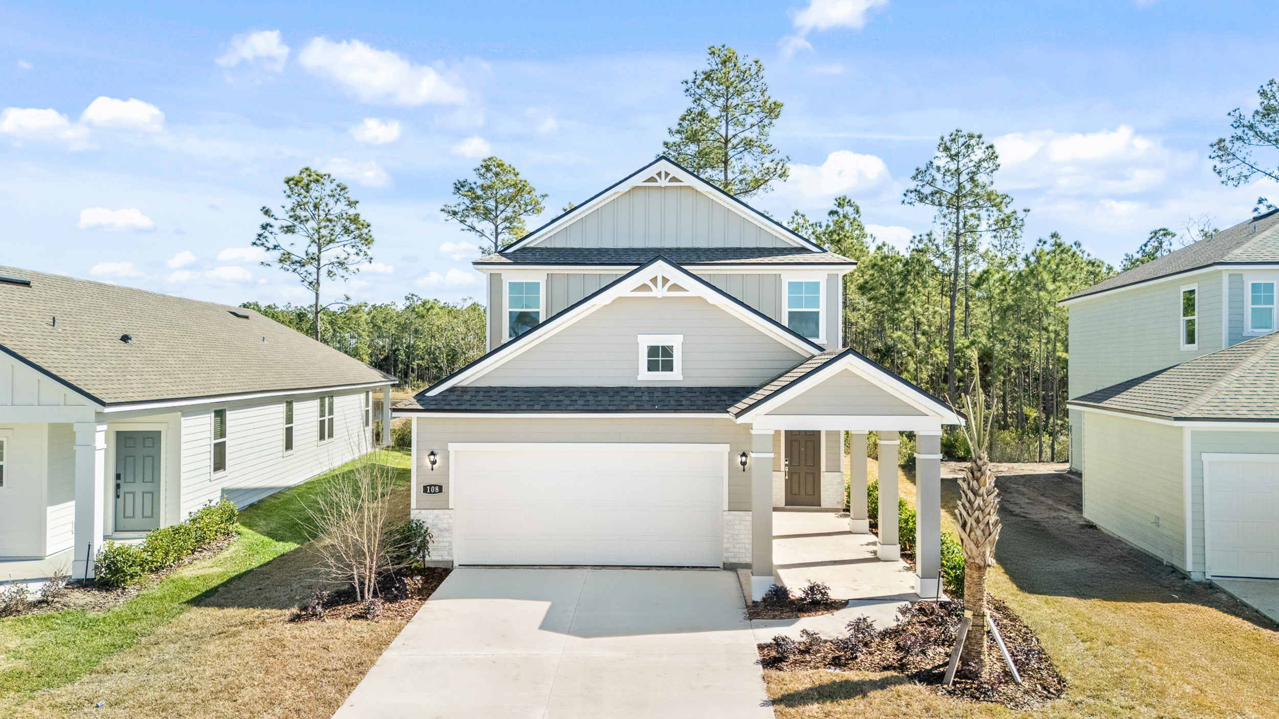 Lot 67 Front Exterior with Brick at Seminole Palms
