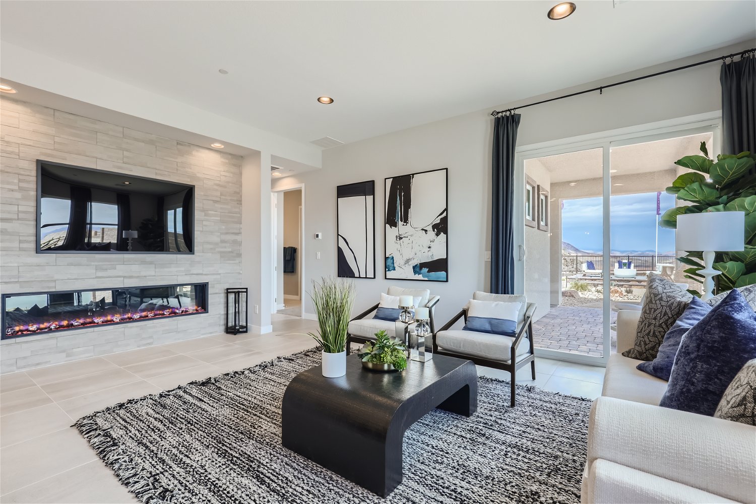 A living room with a fireplace.