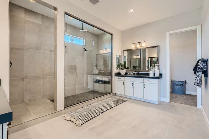 A bathroom with a glass shower.