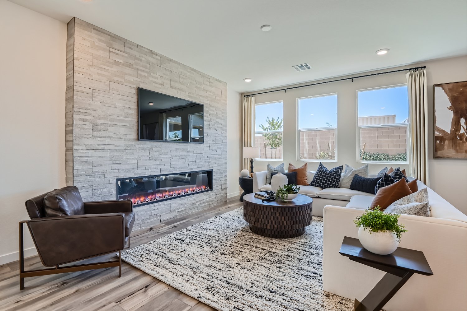 A living room with a fireplace.
