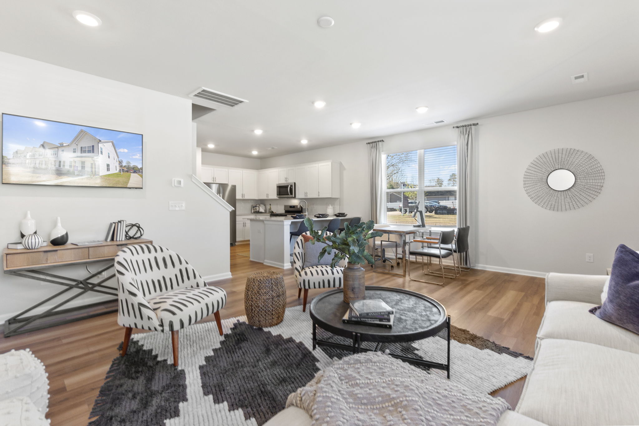 A living room with a large window.