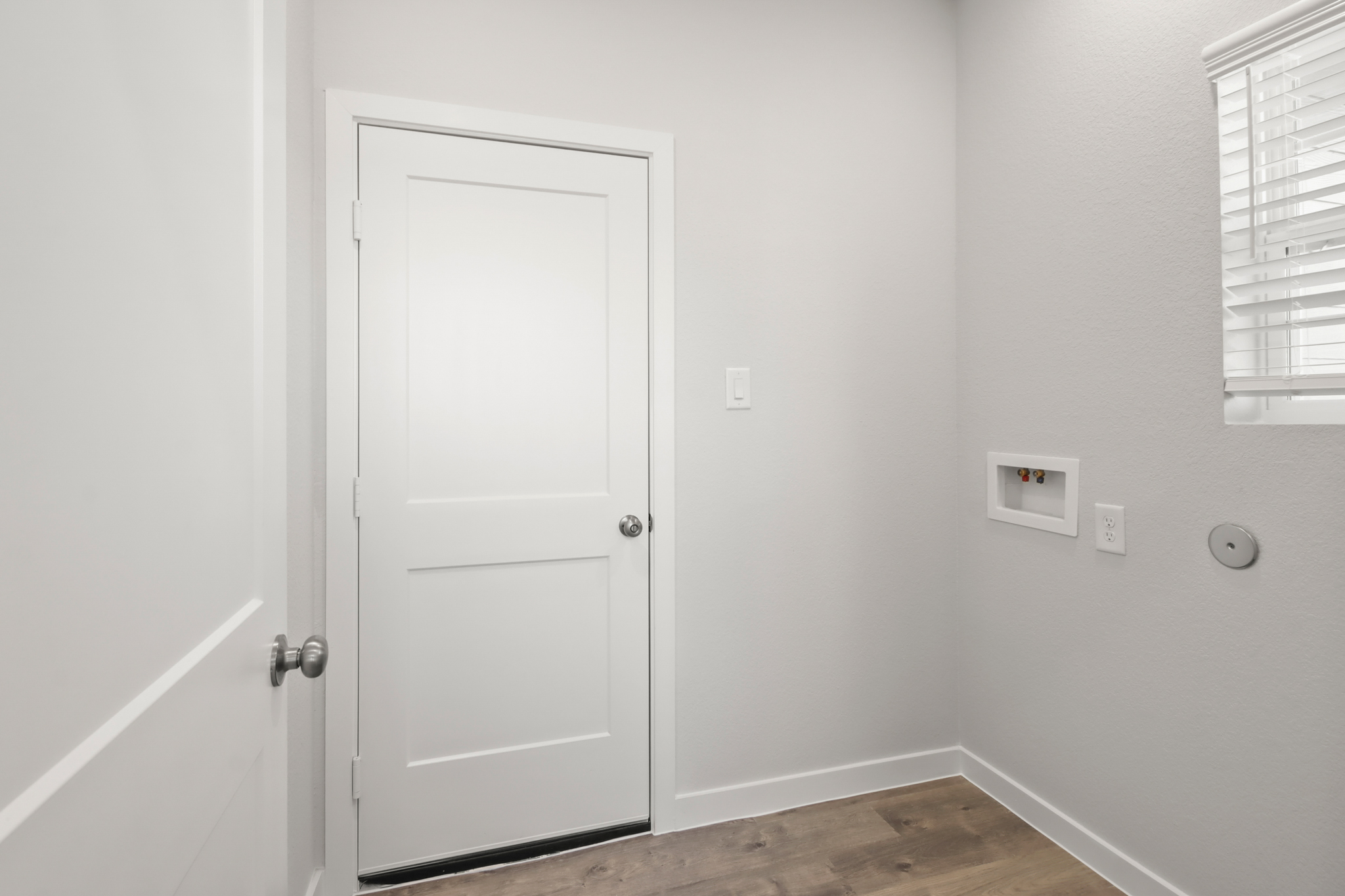 A white door in a room.