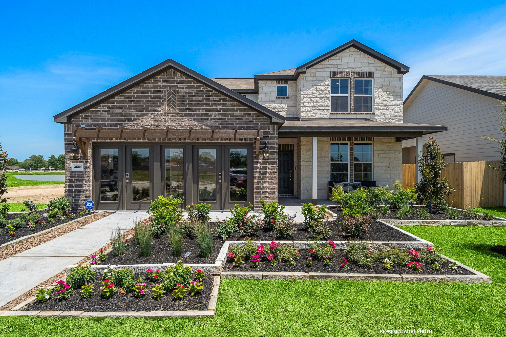 A house with a large front yard.