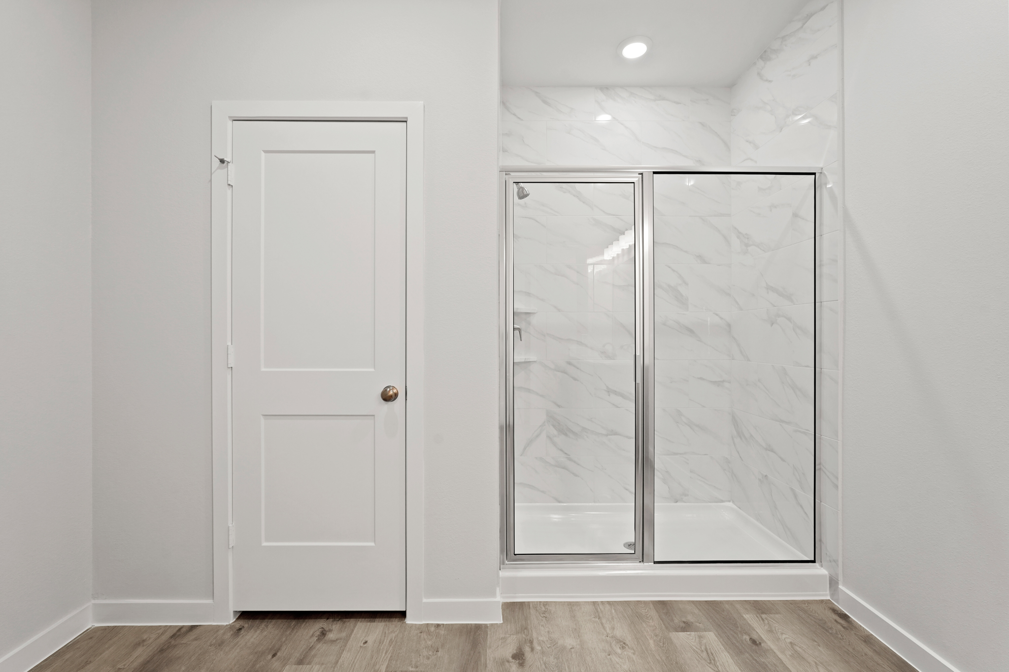 A glass door in a room.