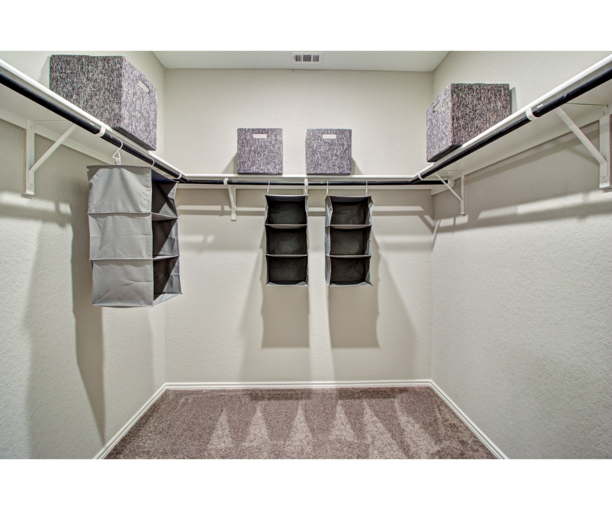 A room with a rug and a rug.