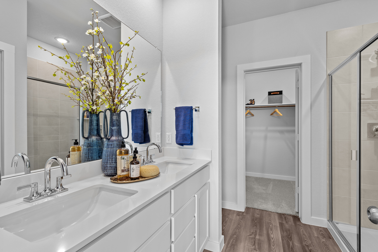 A bathroom with a glass shower.