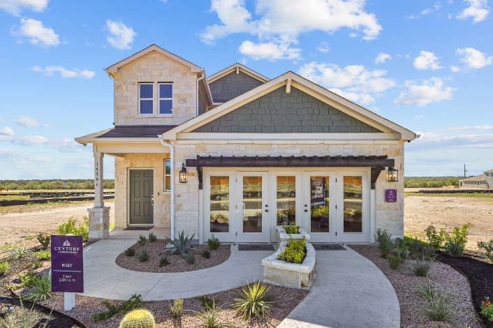 A house with a large front yard.