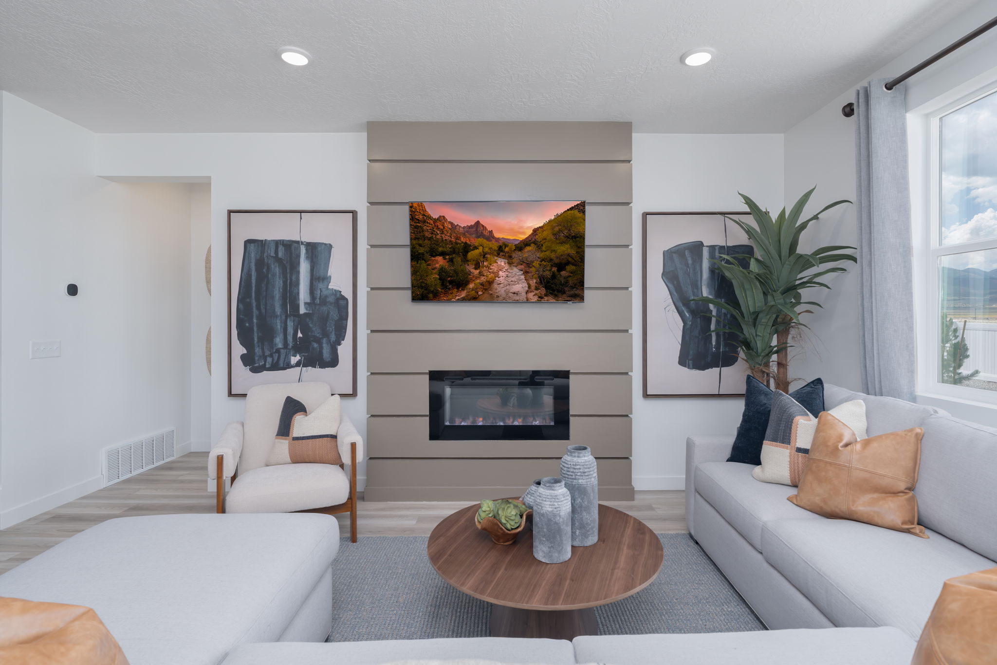 A living room with a fireplace.