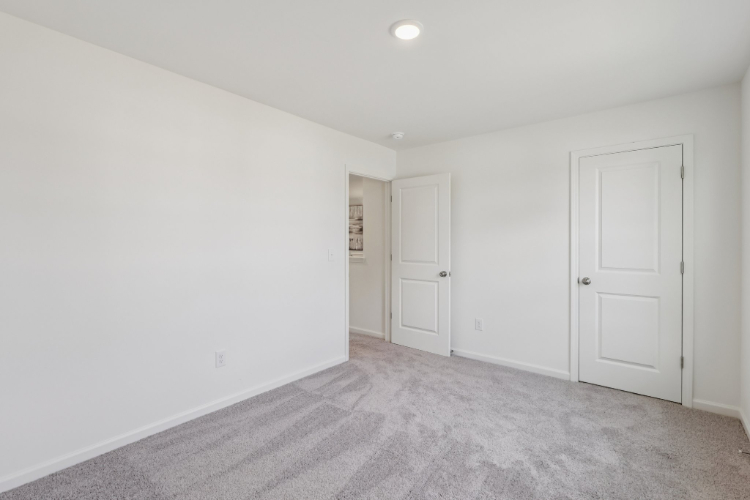 A room with white doors.