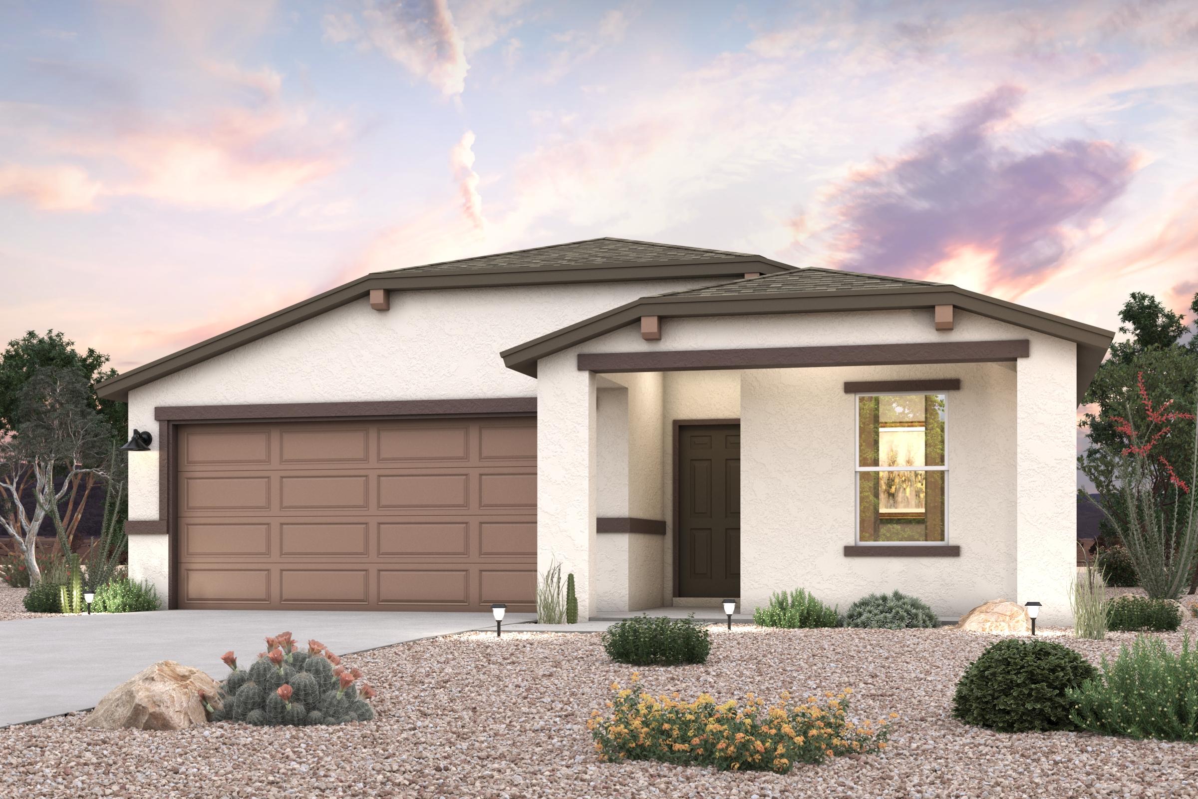 A house with a garage and bushes.