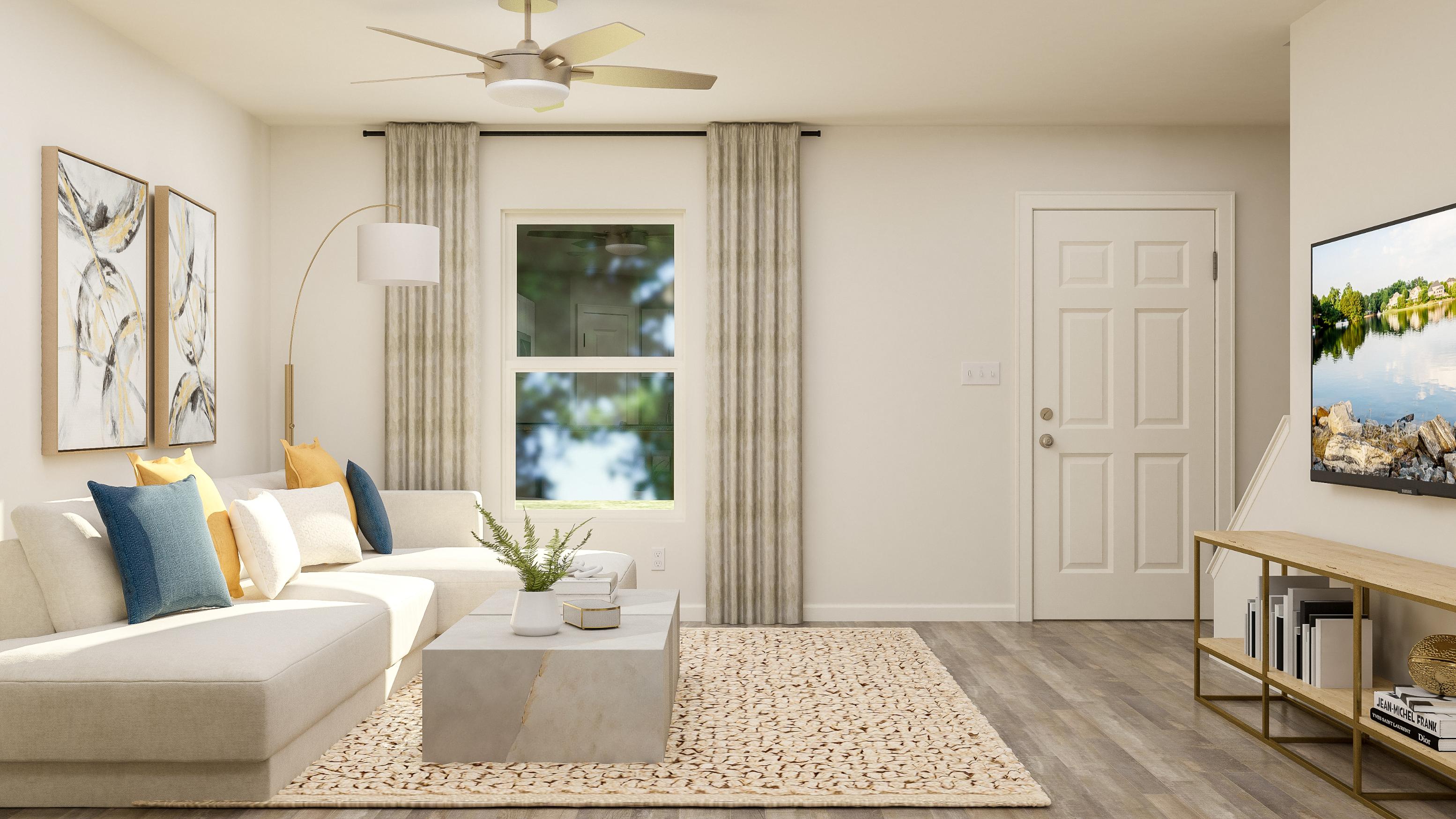 A living room with a couch and a table.