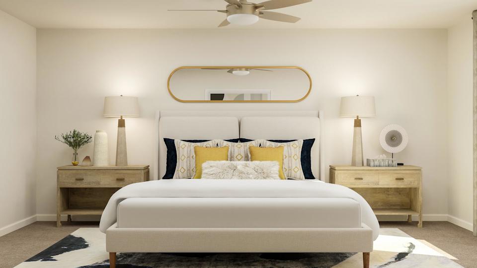 A white couch in a room.