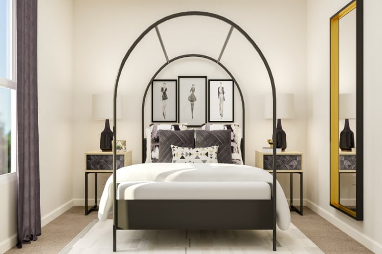 A bedroom with a large mirror.