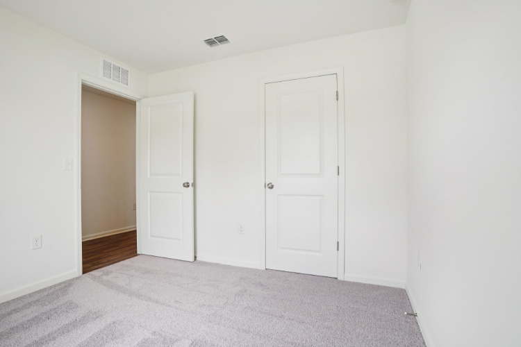 A room with white doors.