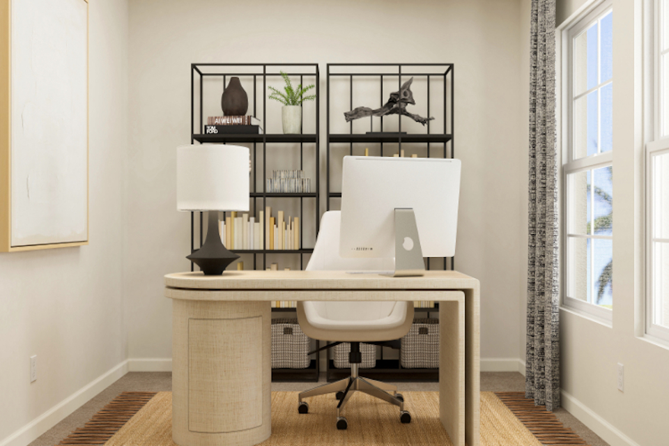 A desk with a chair and a lamp on it.