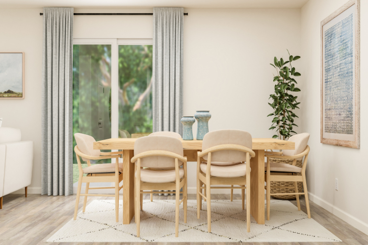 A dining room table with chairs around it.