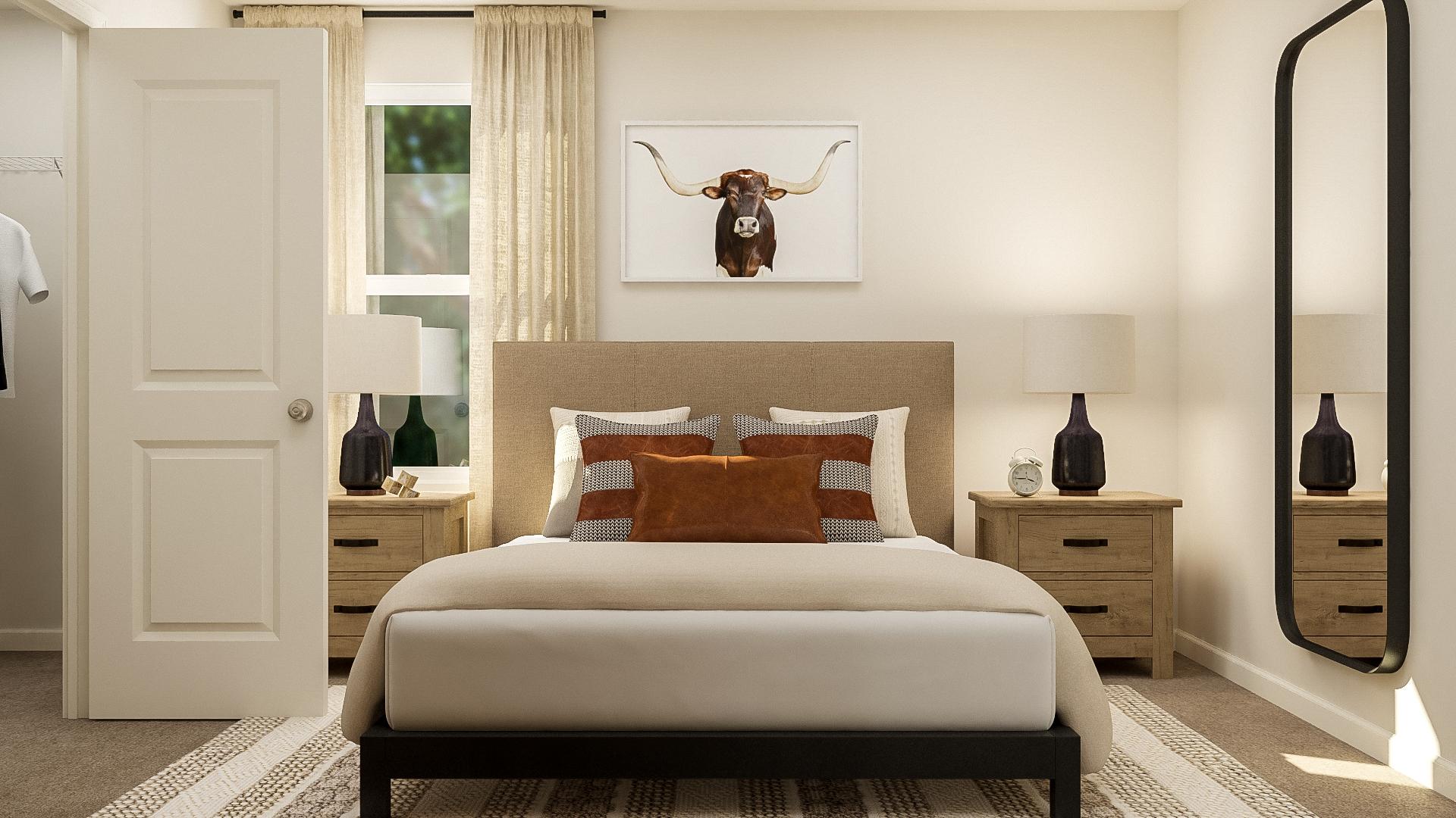 A bedroom with a bed and lamps.