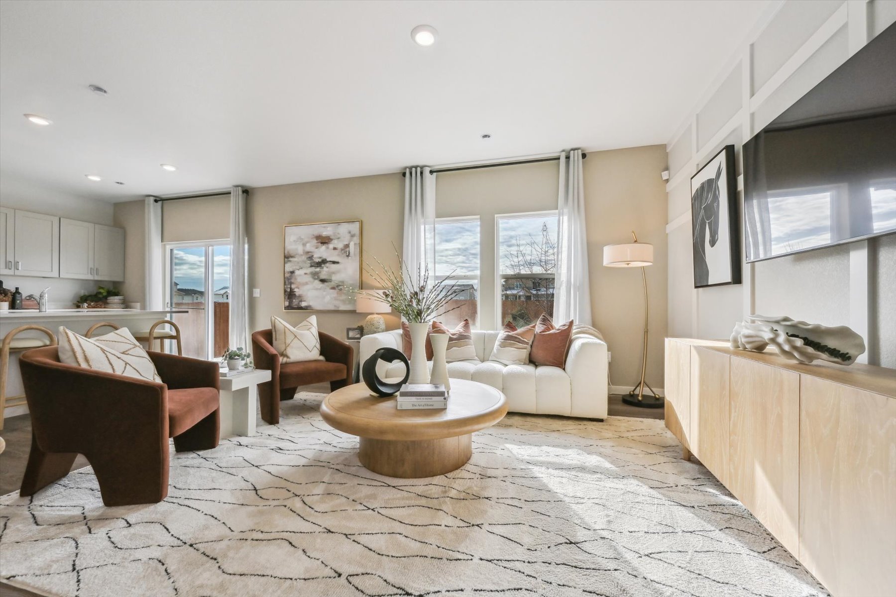 A living room with a large window.